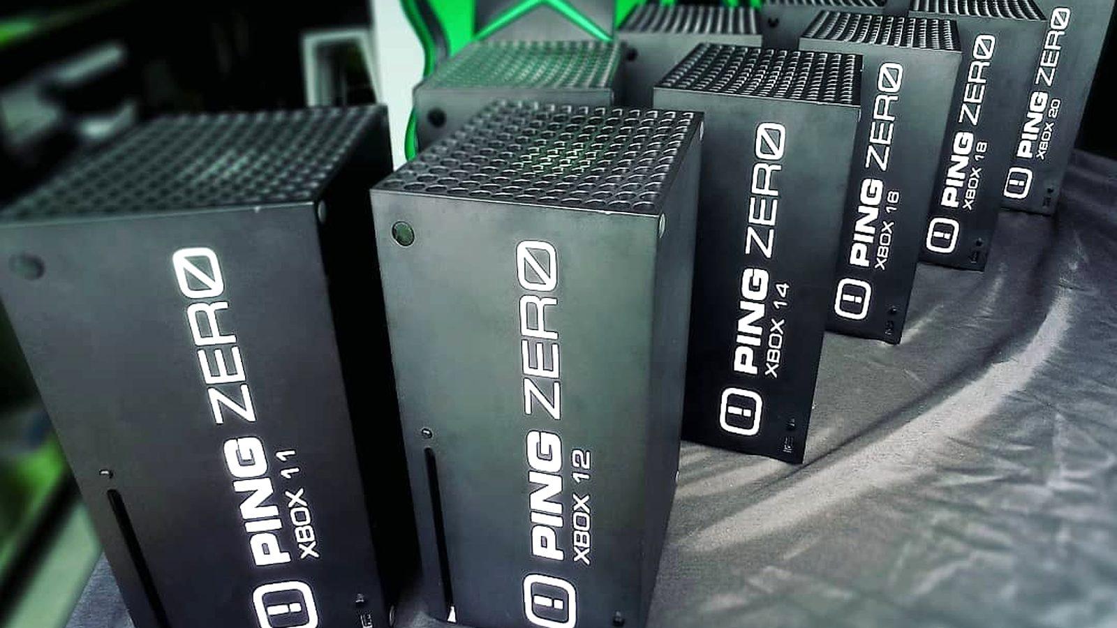 A row of Ping Zero branded Xbox consoles